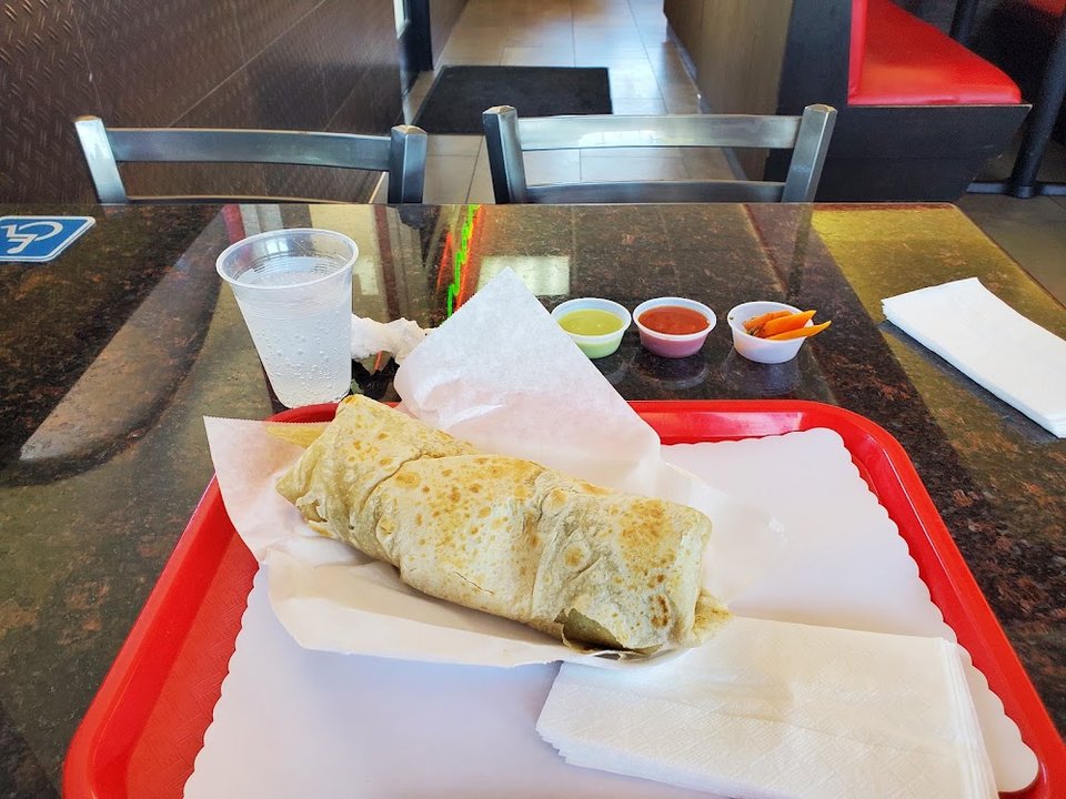 Counter menu with breakfast, lunch, and dinner items.